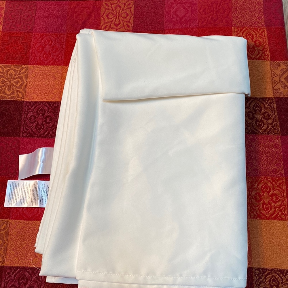White fabric— long and wide.